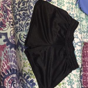Girls black BCG mesh athletic shorts.